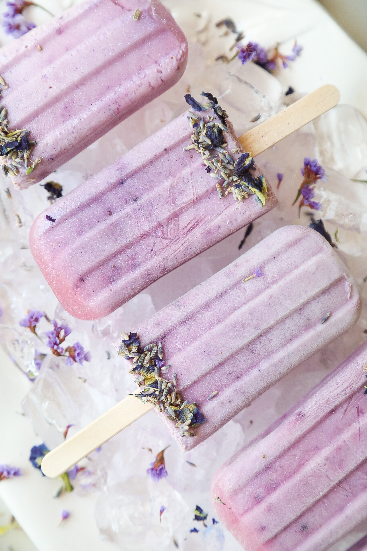 Boozy Lavender Blueberry Creamsicles made with Empress Gin. #creamsicles #dessert #lavender #blueberry #gin